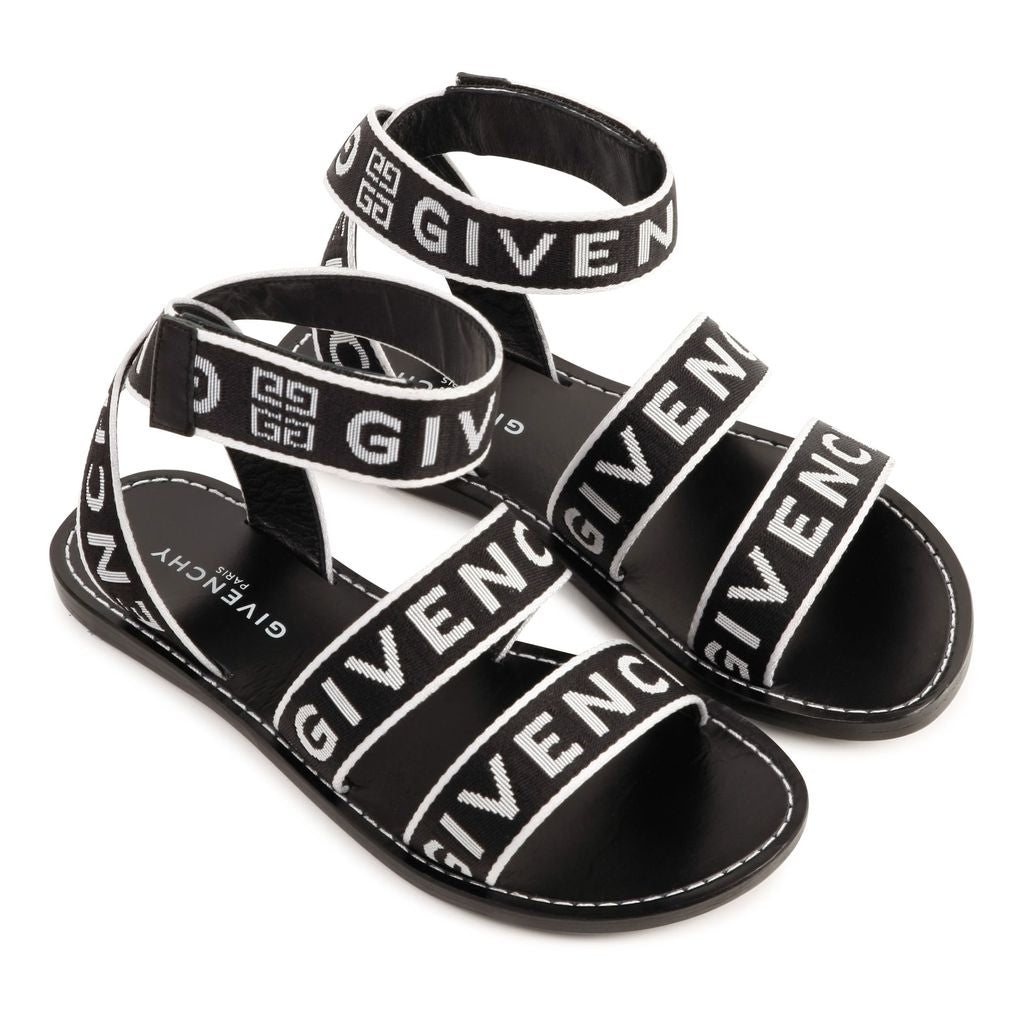 Black and white branded logo sandals