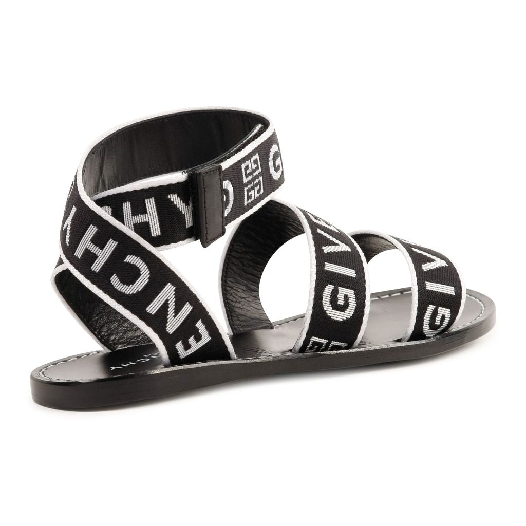 Black and white branded logo sandals