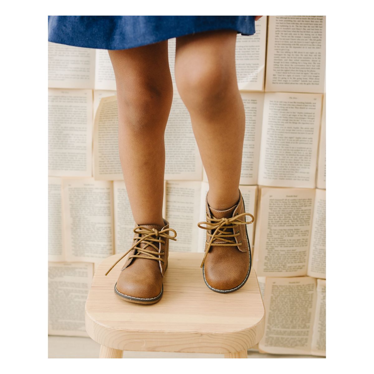 Black lace-up boots.