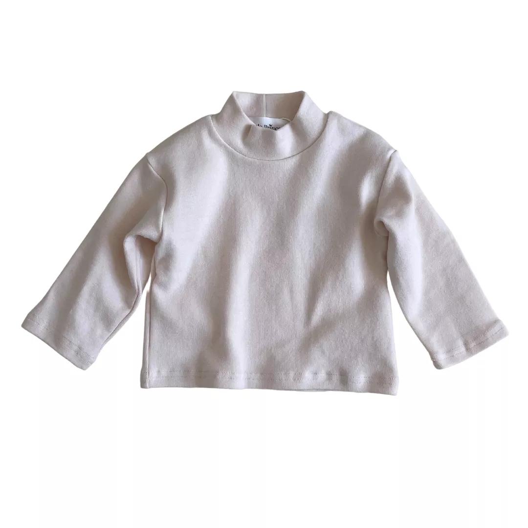 Ivory turtleneck top