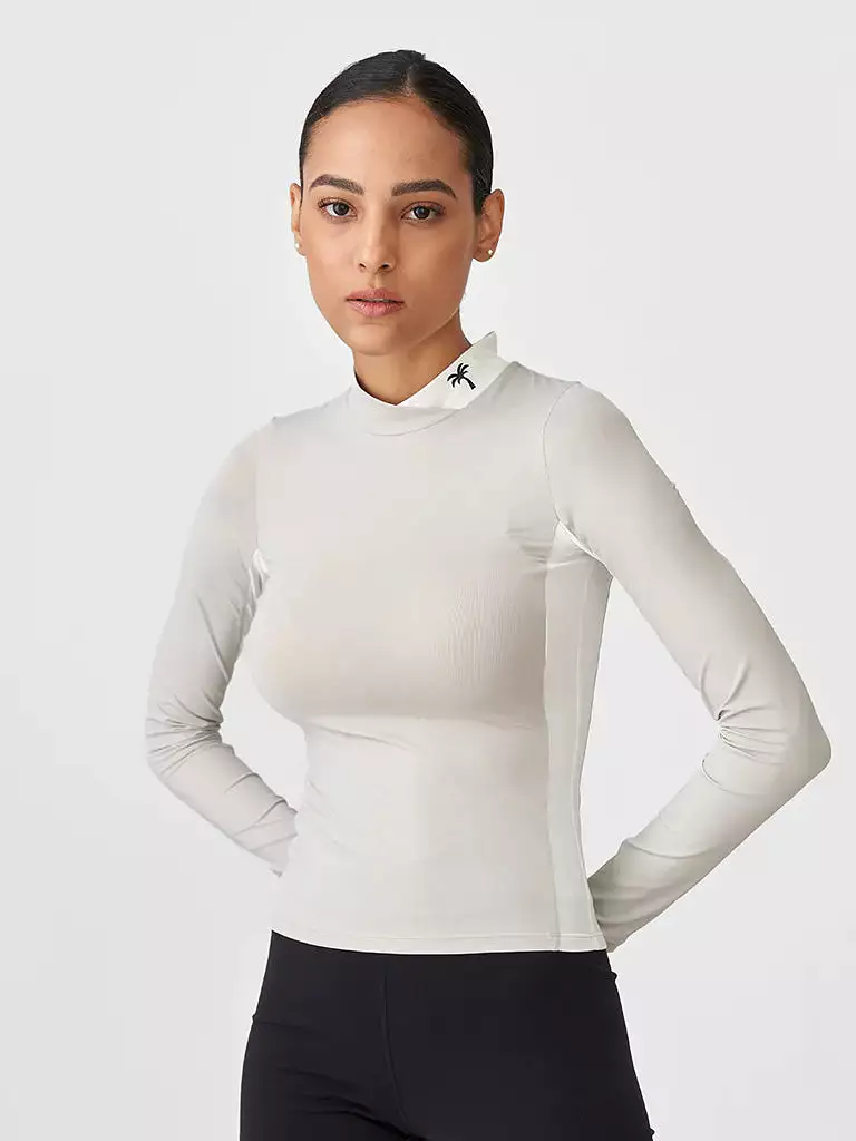 Minus1 golf sun protection turtleneck base layer can be rewritten as Sun protection turtleneck base layer for golf - Minus1