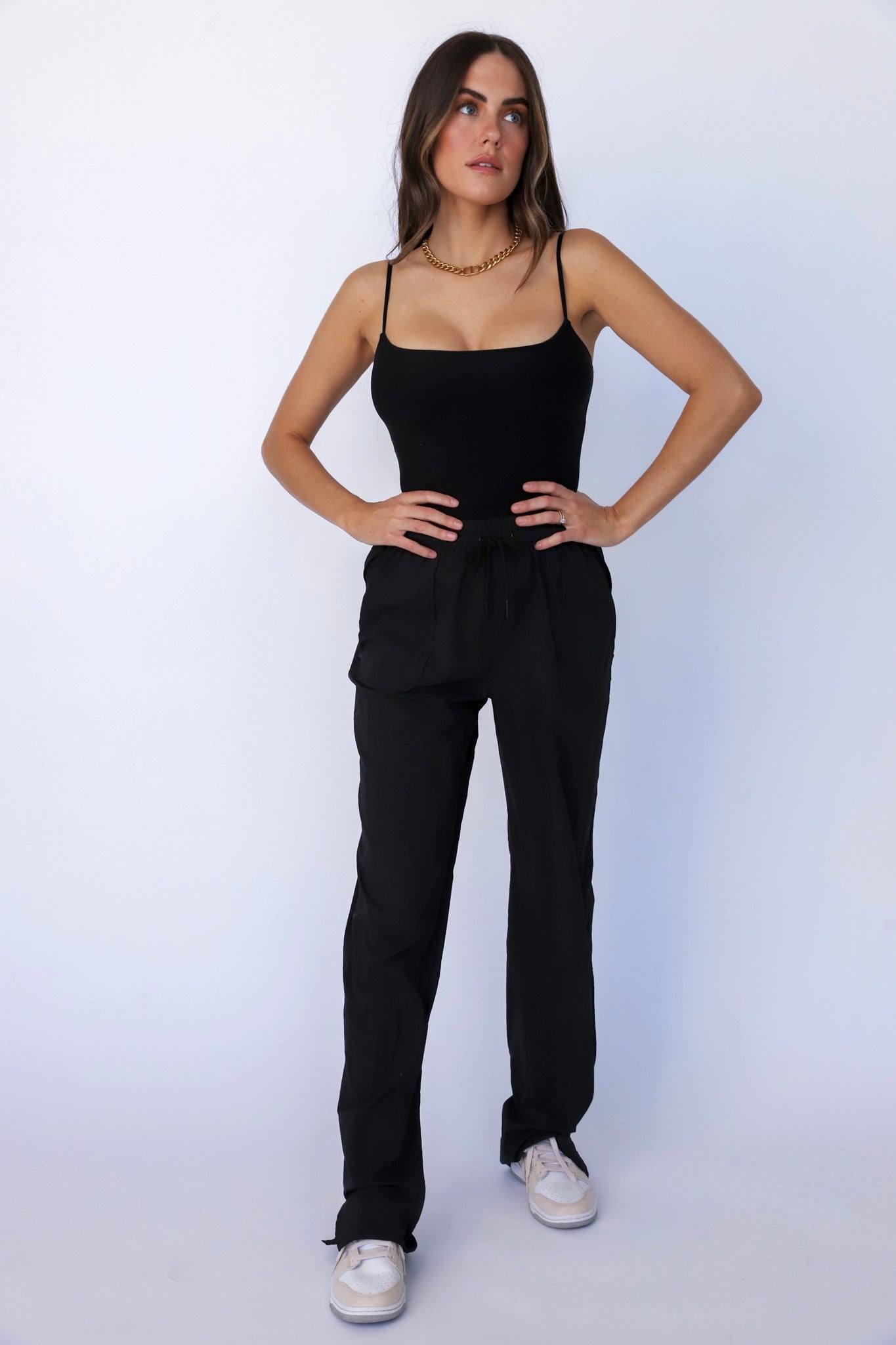 Relaxed Rebel Bodysuit - Trendy rebellious body-hugging jumpsuit that offers a comfortable and relaxed fit.