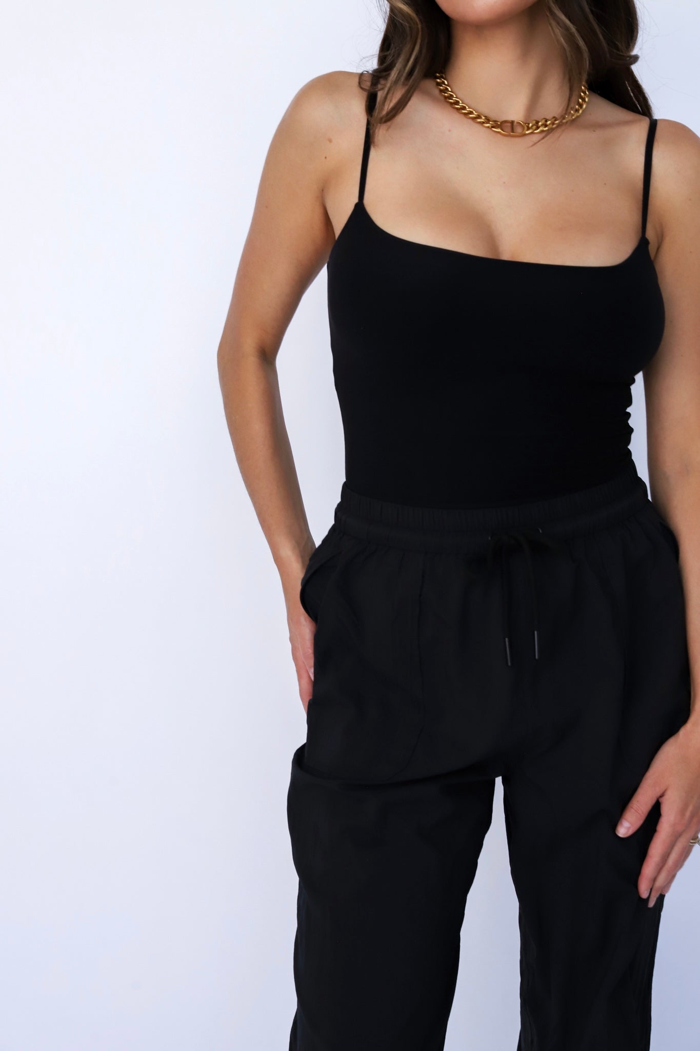 Relaxed Rebel Bodysuit - Trendy rebellious body-hugging jumpsuit that offers a comfortable and relaxed fit.