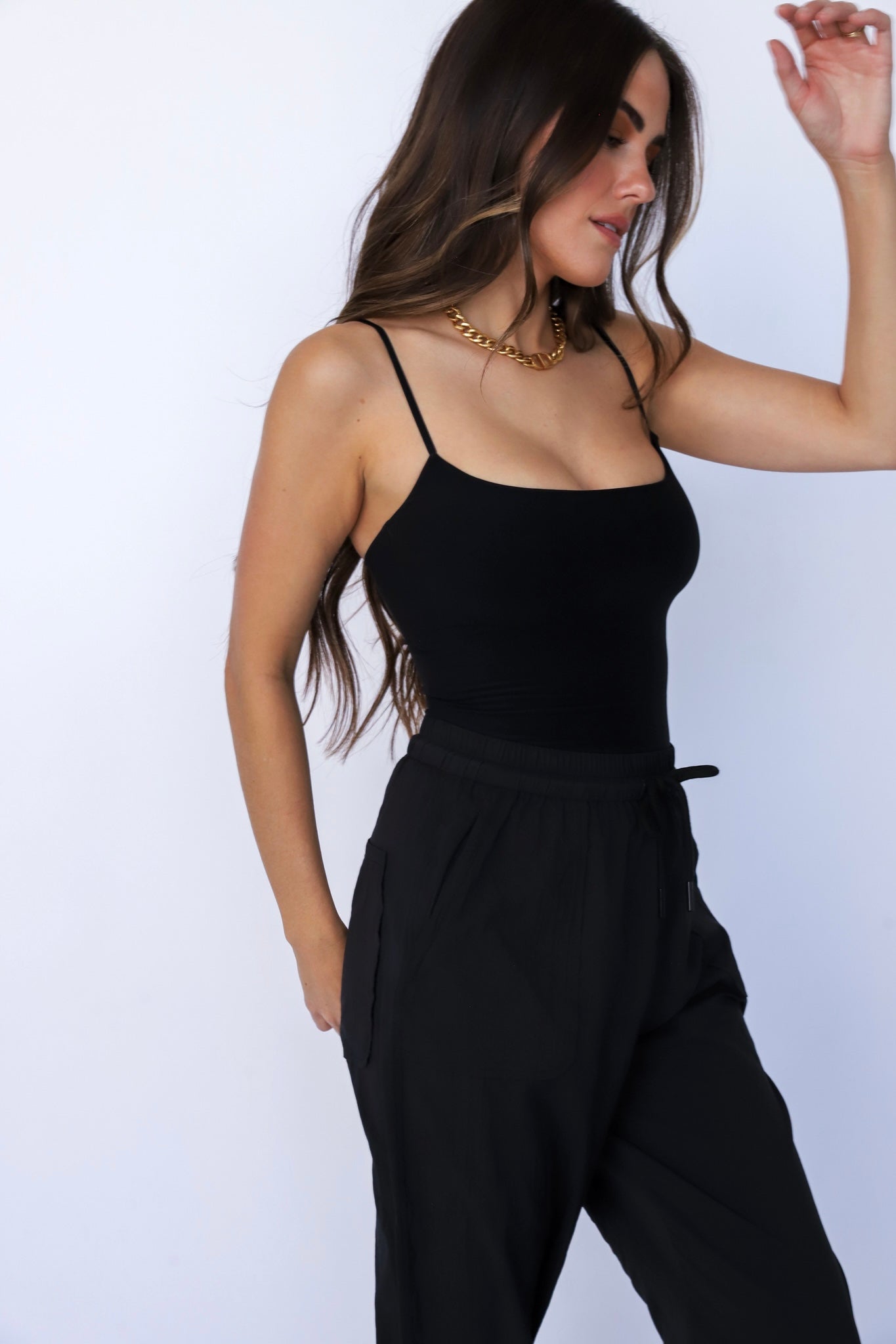 Relaxed Rebel Bodysuit - Trendy rebellious body-hugging jumpsuit that offers a comfortable and relaxed fit.