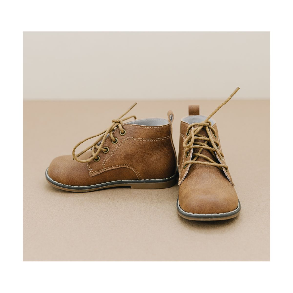 The result of rewriting Clio Lace Up Boot into more Google SEO friendly words is Stylish Lace Up Boot - Clio Collection.