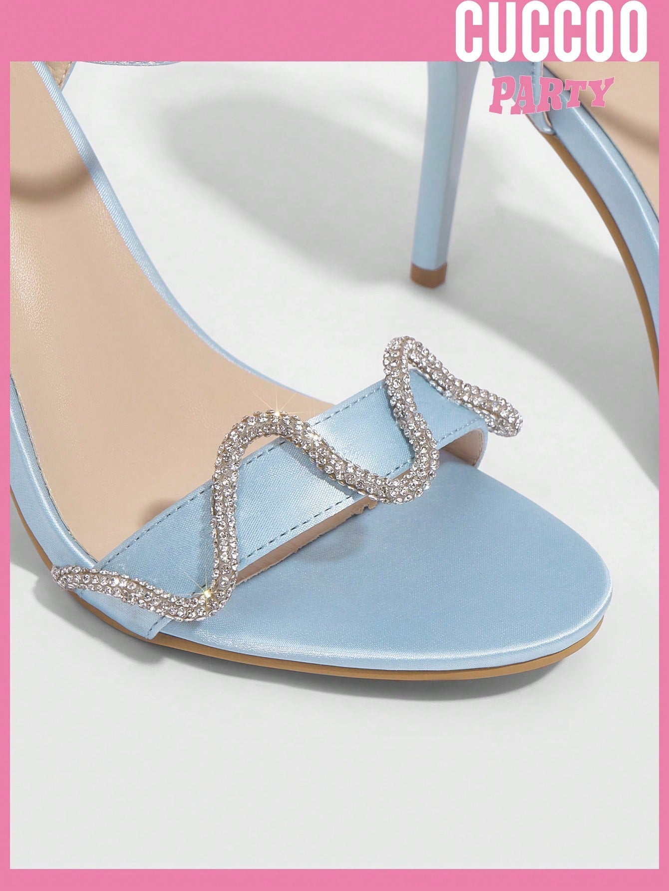 Women's pointed toe stiletto sandals with rhinestone details for spring and summer wedding attire.